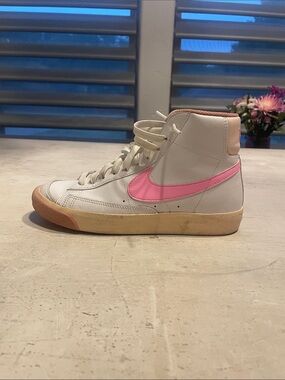 Nike Women's High-Top Sneakers in White with Pink Swoosh